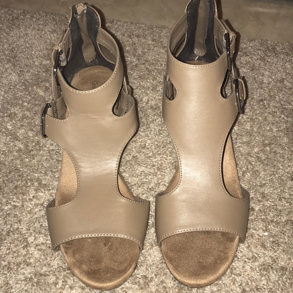 Tan open toed sandals with wedge heel